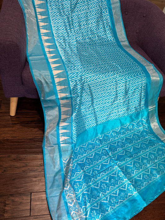 **New** Blue Ikkat Pattu Silk Saree with Self Color Stitched Blouse