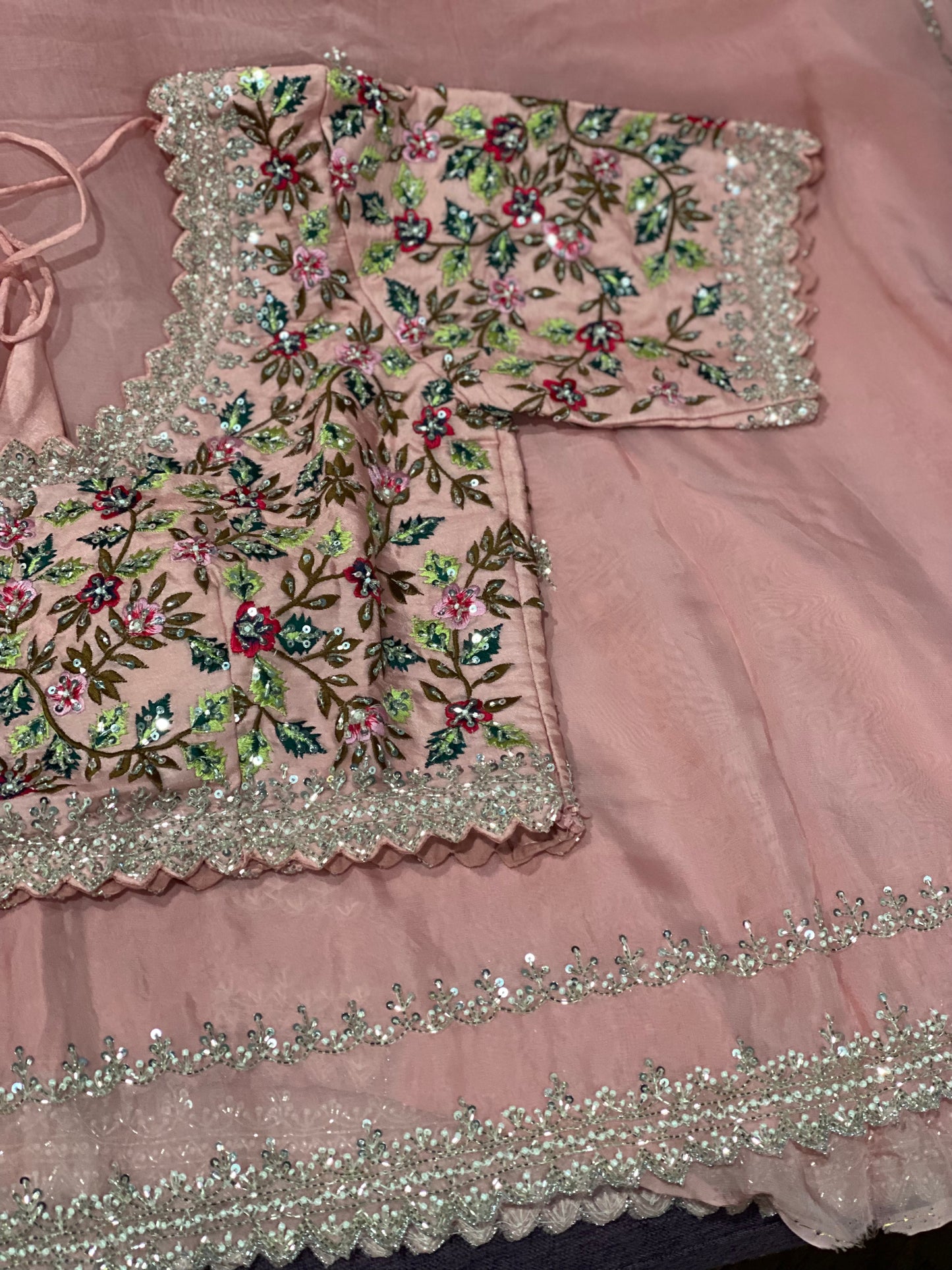 **New**Organza saree with work paired with floral work blouse